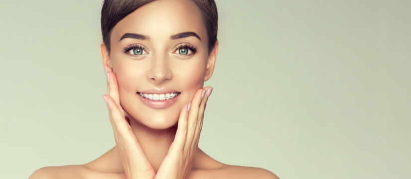 Smiling young woman with clean healthy teeth